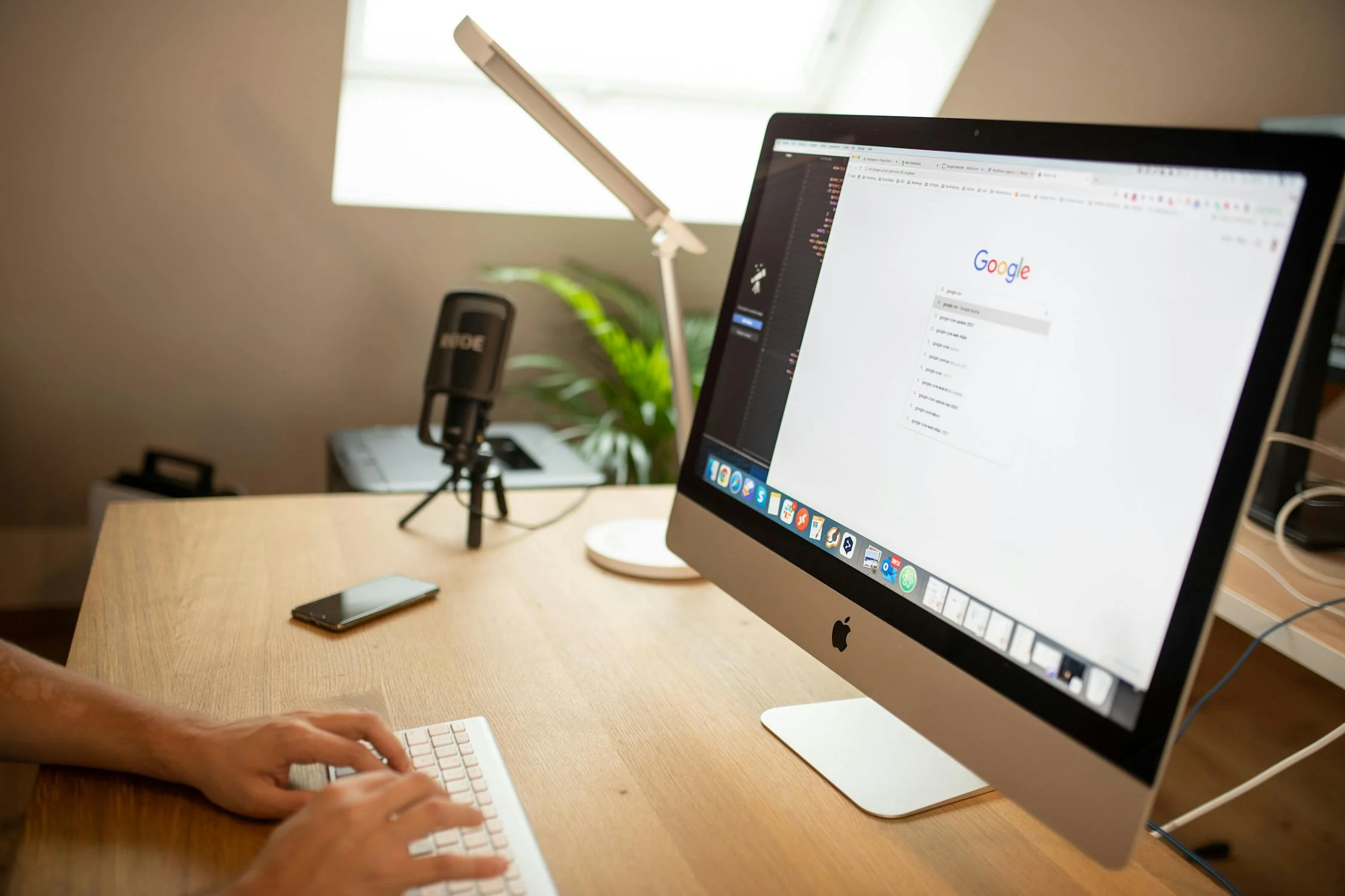 person working on computer - generate leads through seo