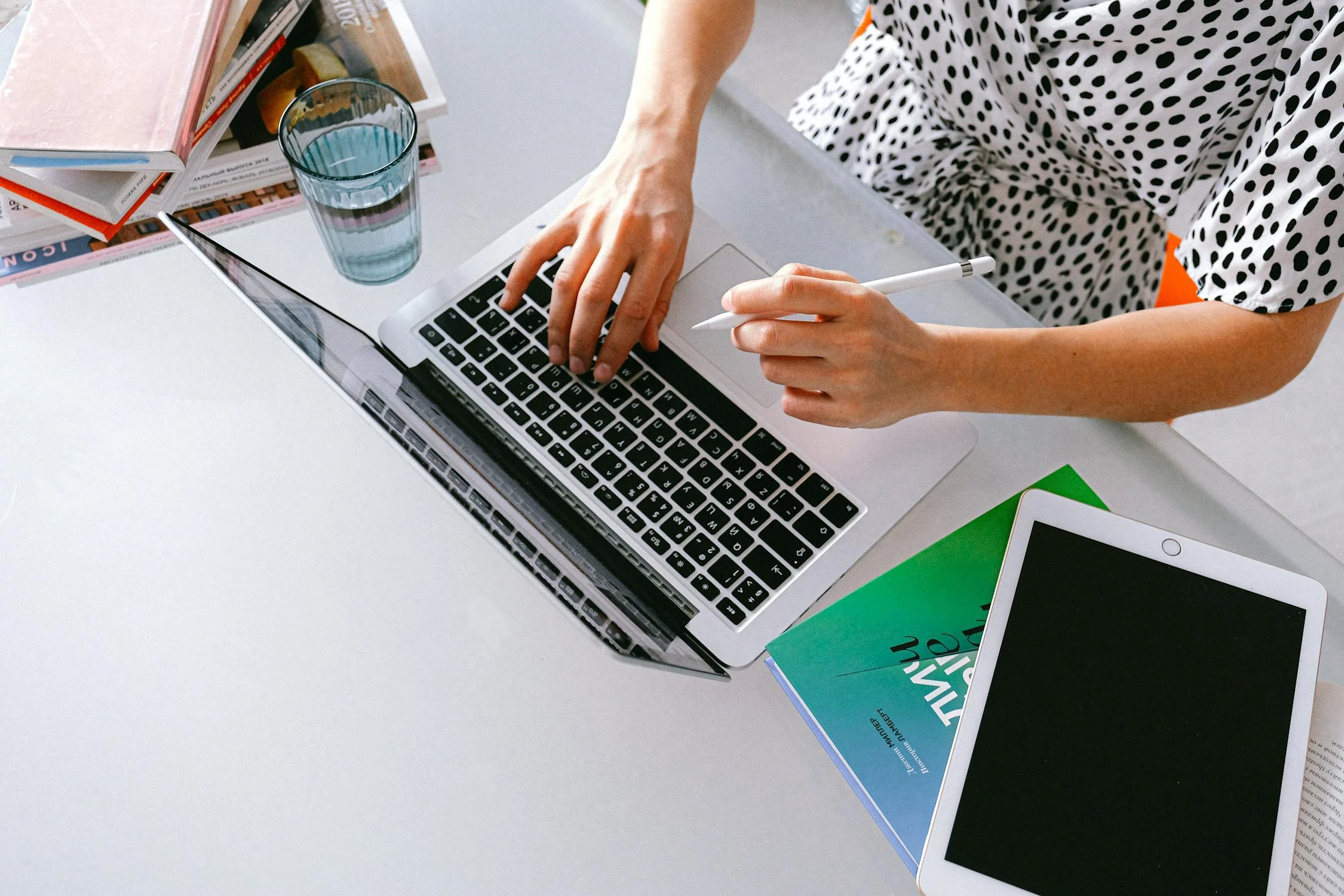 person using laptop - citations for seo