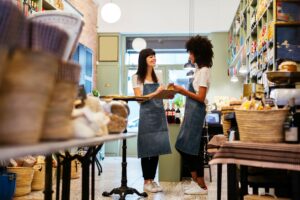 two women in a store, representing the importance of local SEO updates 2026 to local businesses in places like South Texas