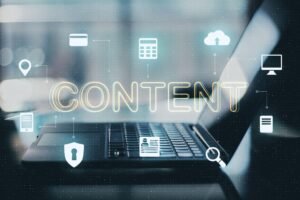 The word “content” overlaid on an image of a laptop, representing AI-driven analysis